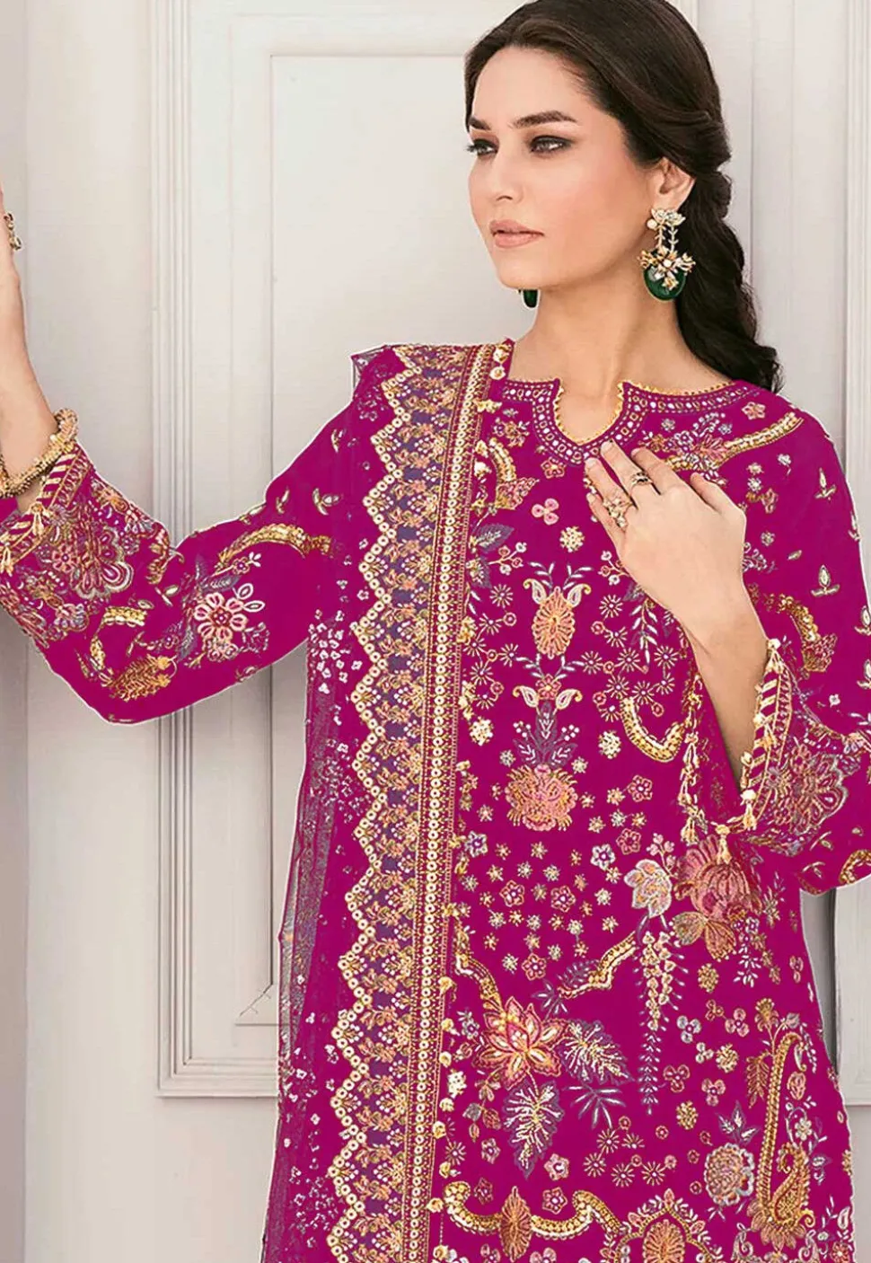 Embroidered Georgette Pakistani Suit in Fuchsia