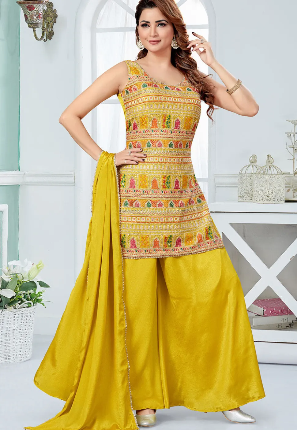 Embroidered Georgette Pakistani Suit in Yellow