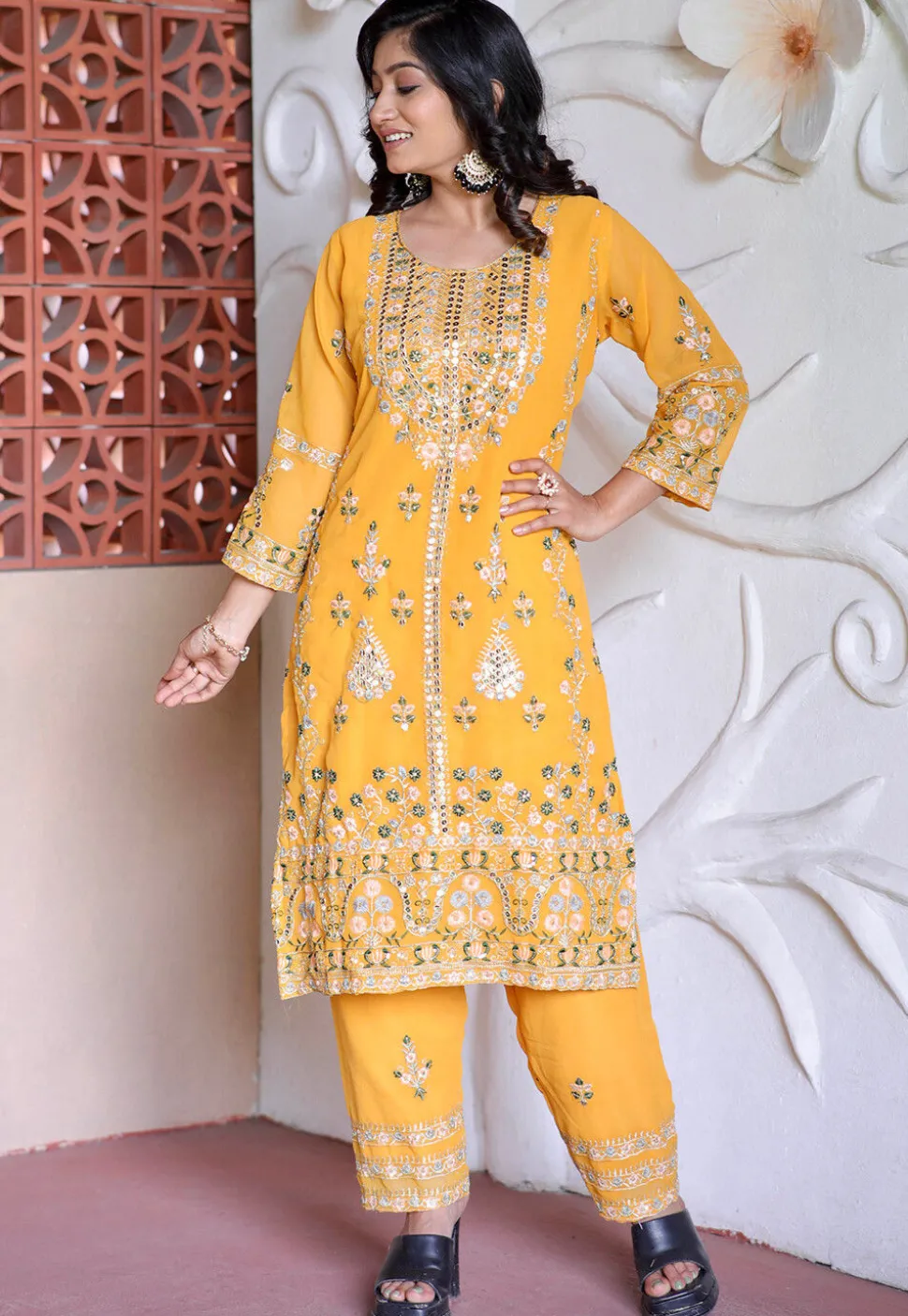Embroidered Georgette Pakistani Suit in Yellow