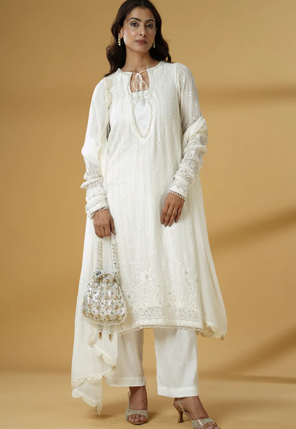 Embroidered Georgette Pakistani Suit in Off White