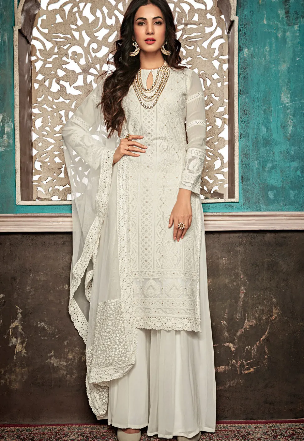 Embroidered Georgette Pakistani Suit in Off White