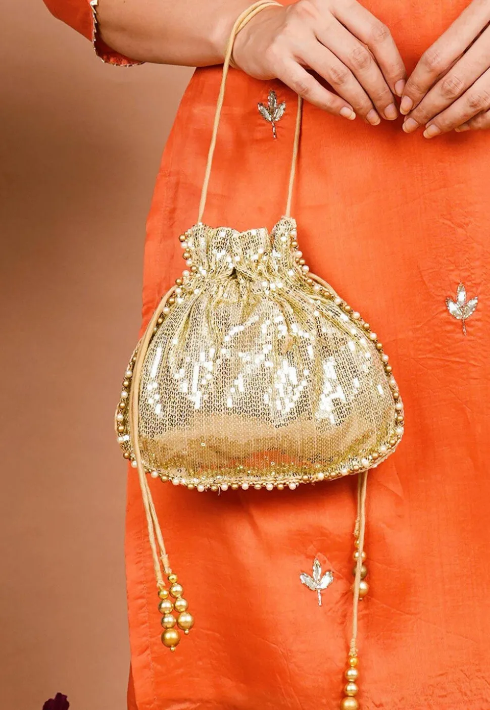 Embroidered Georgette Potli Bag in Golden