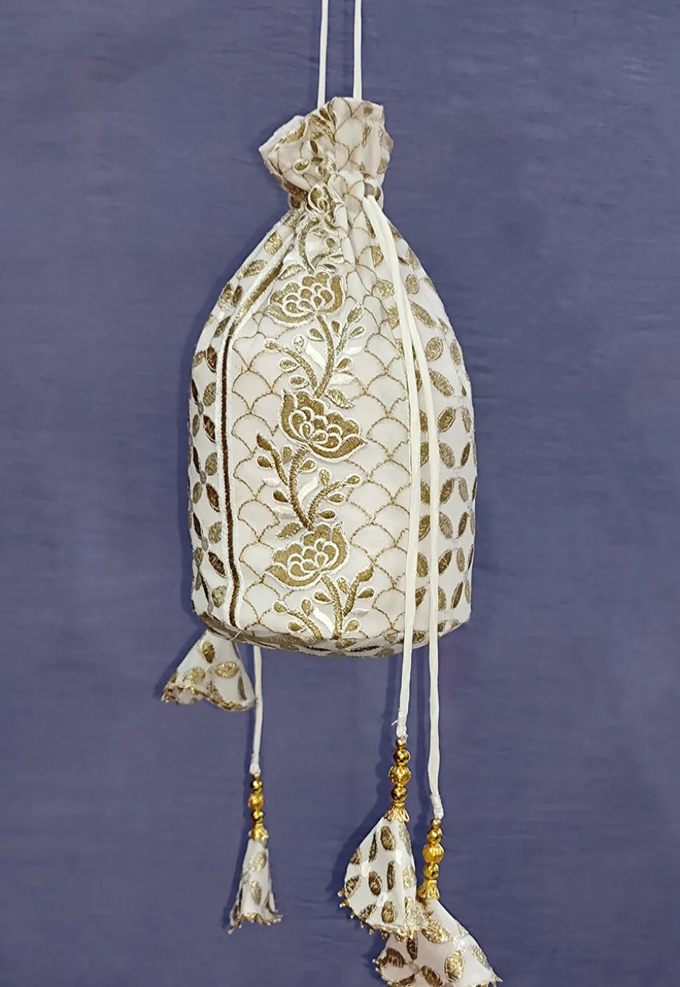 Embroidered Georgette Potli Bag in Off White