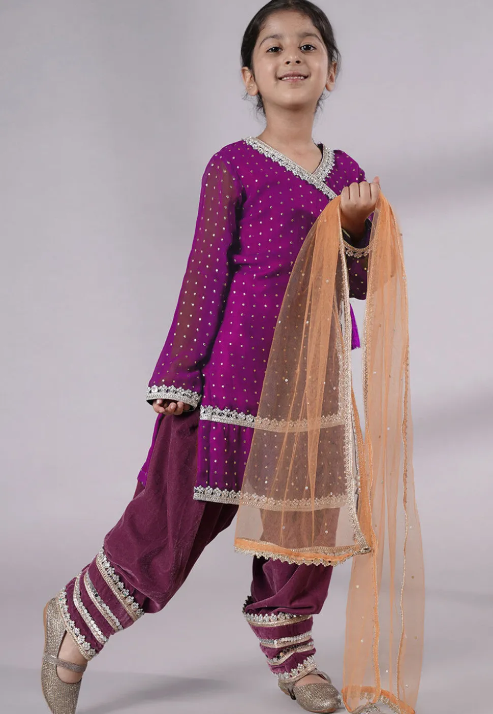 Embroidered Georgette Punjabi Suit in Magenta