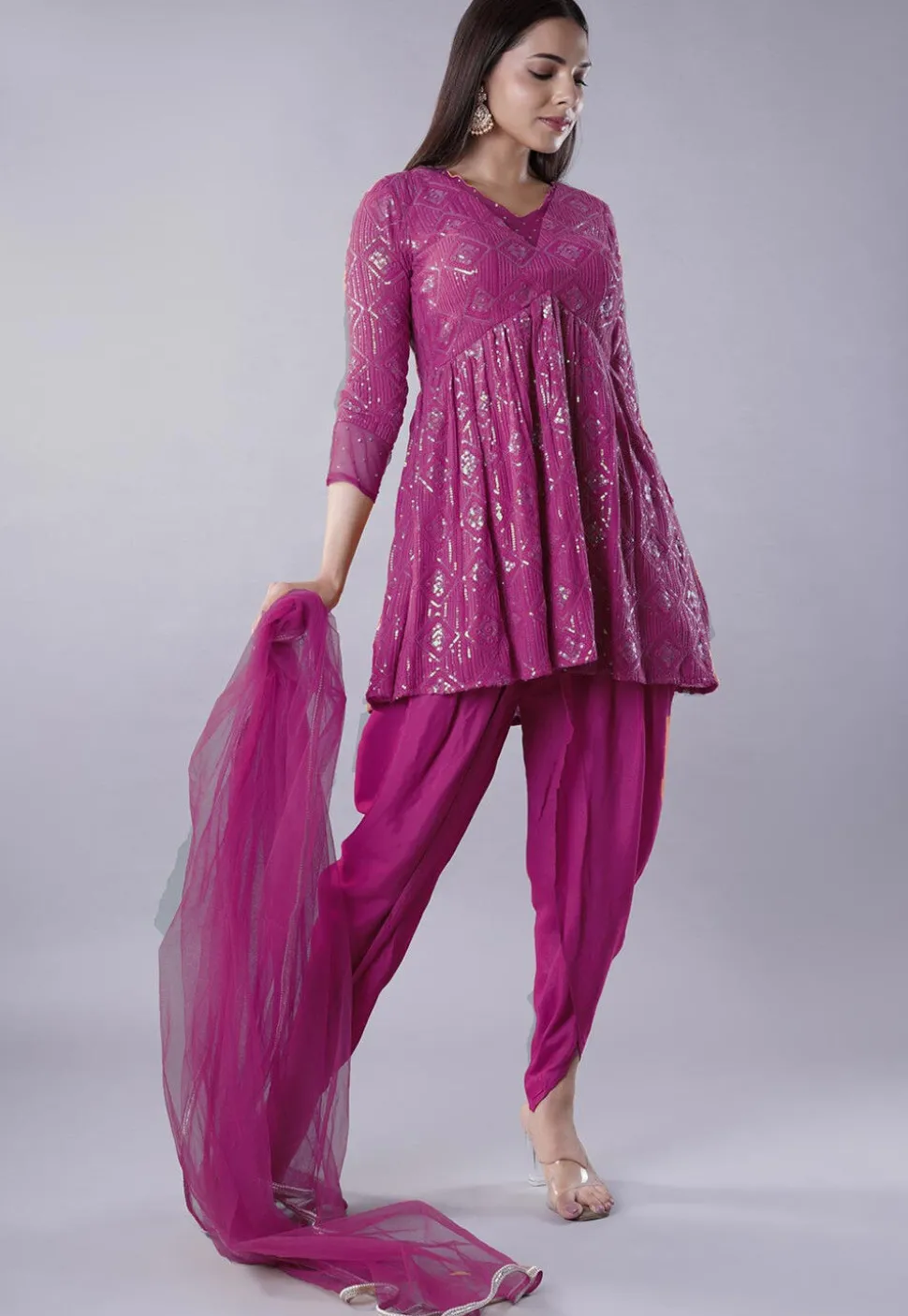 Embroidered Georgette Punjabi Suit in Magenta