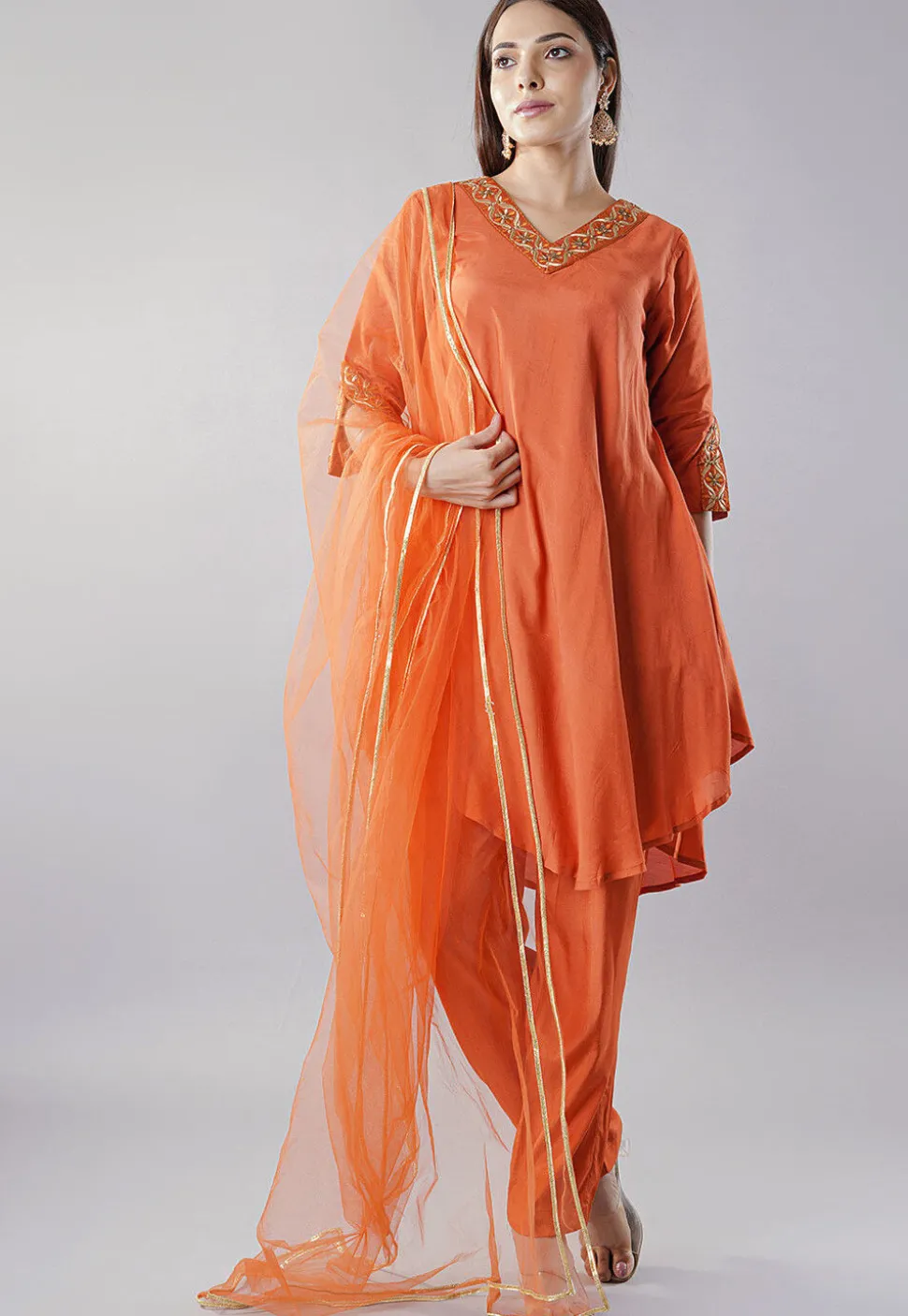 Embroidered Muslin Silk Pakistani Suit in Rust