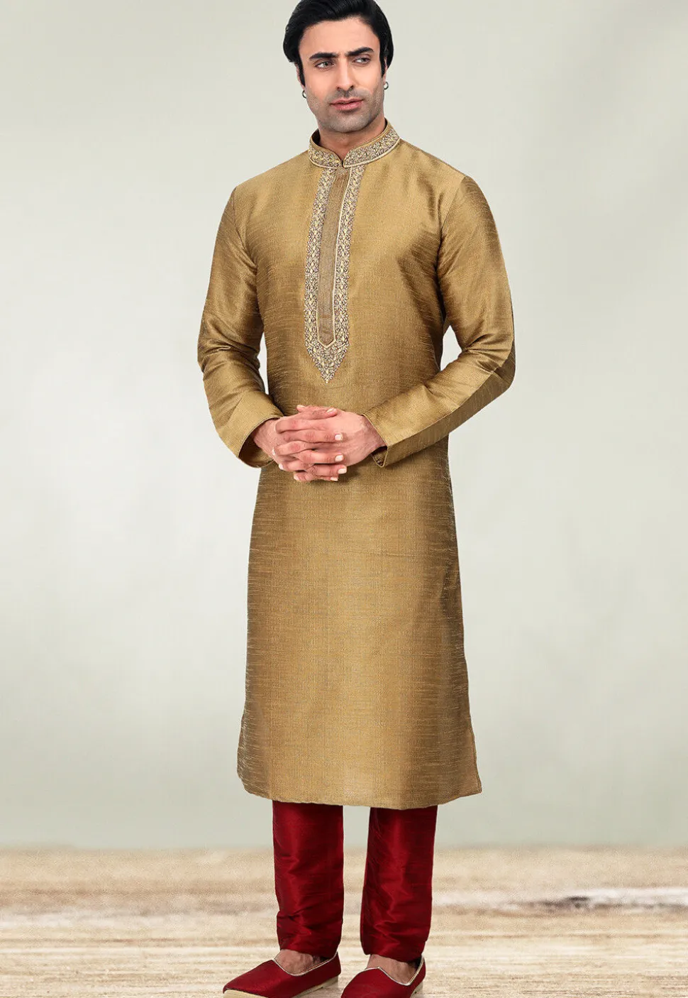 Embroidered Neckline Art Silk Kurta Set in Golden