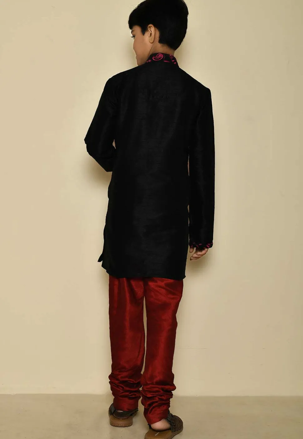 Embroidered Neckline Dupion Silk Kurta Set in Black