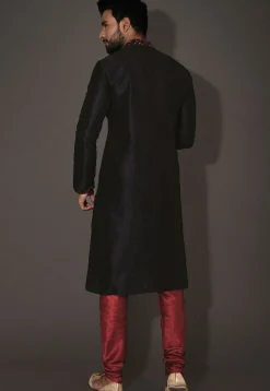 Embroidered Neckline Dupion Silk Kurta Set in Black
