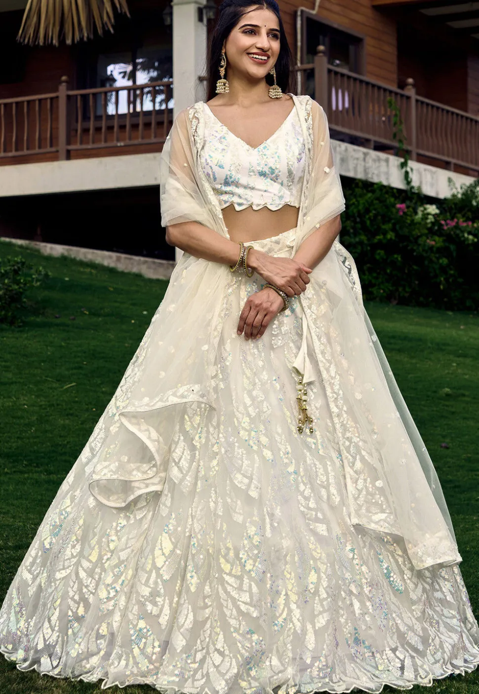 Embroidered Net Lehenga in Off White