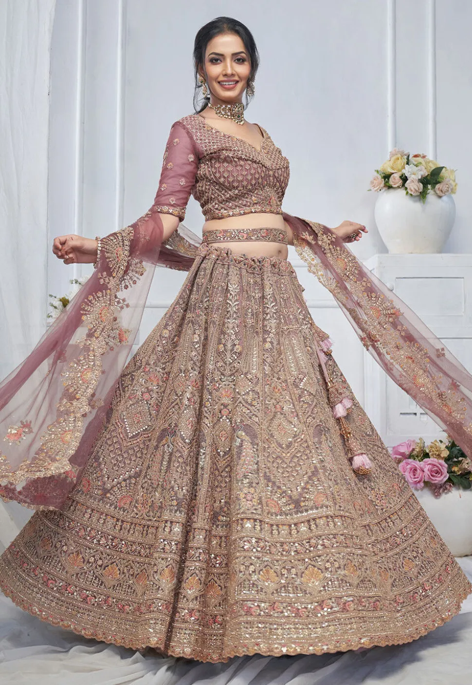 Embroidered Net Lehenga in Purple