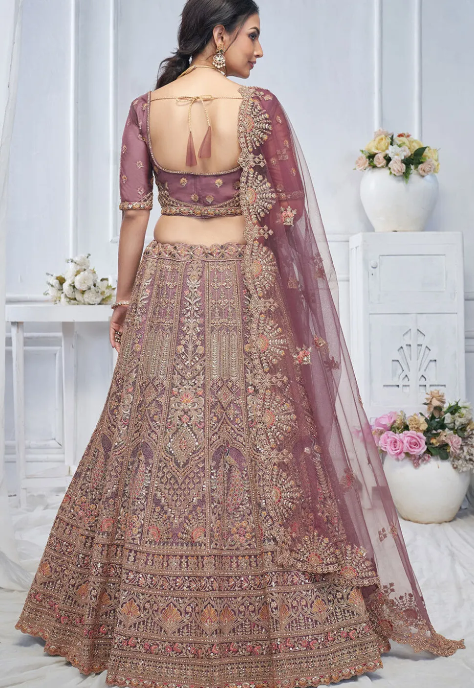 Embroidered Net Lehenga in Purple