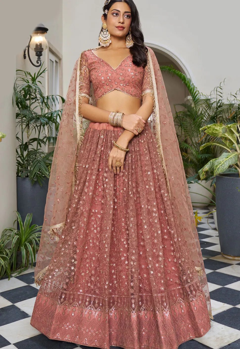 Embroidered Net Lehenga in Peach
