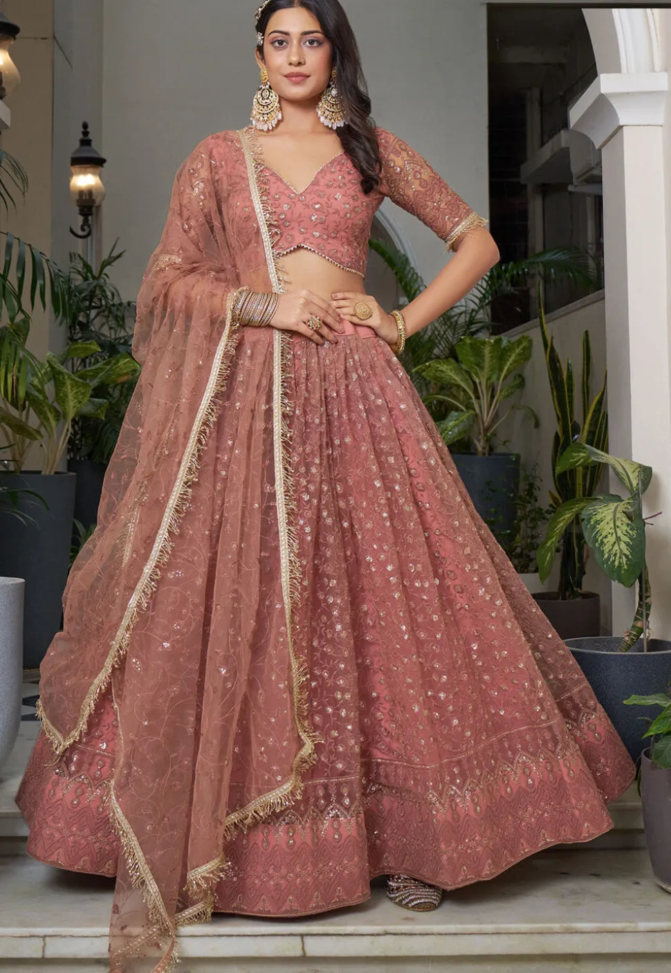 Embroidered Net Lehenga in Peach