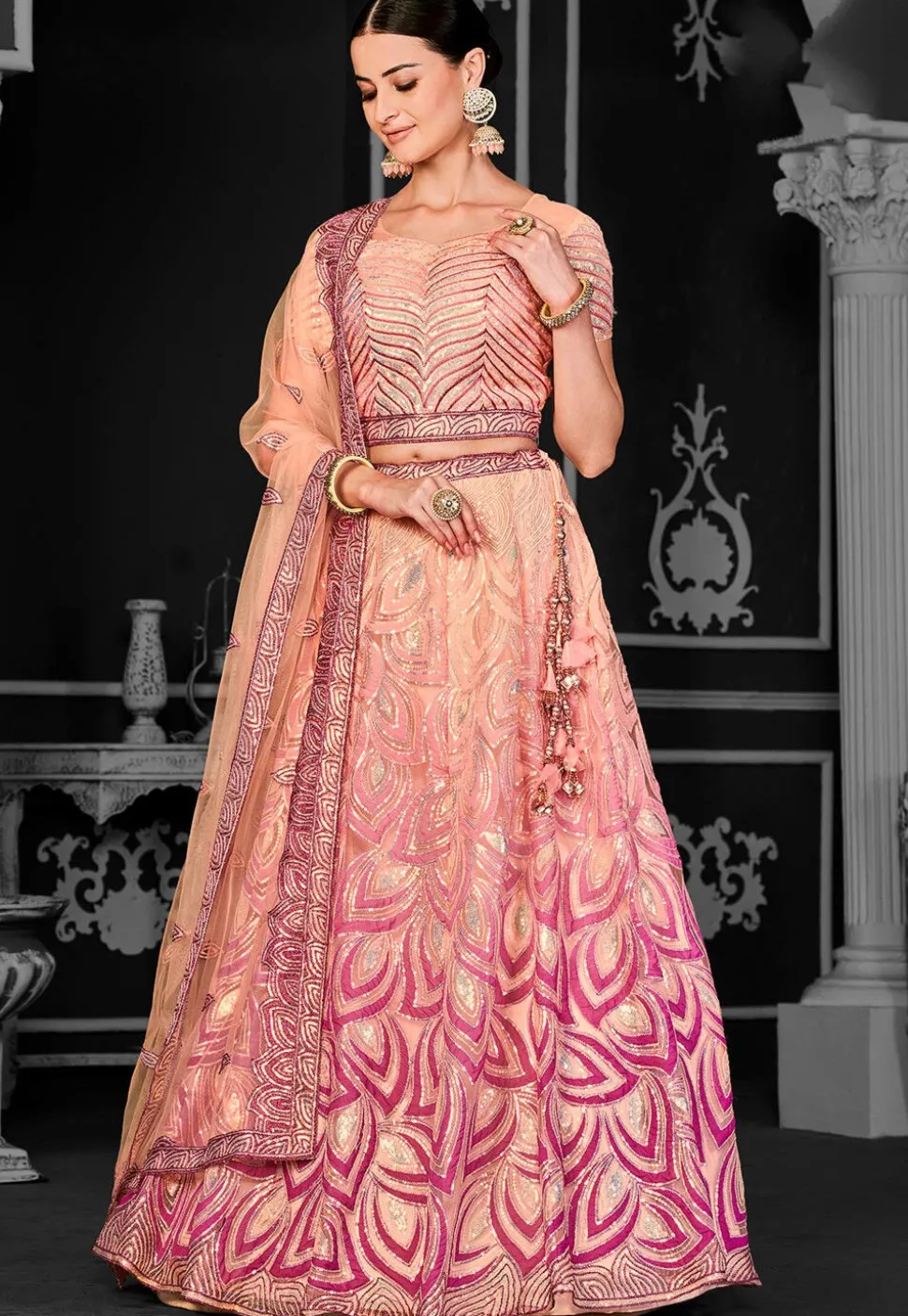 Embroidered Net Lehenga in Peach