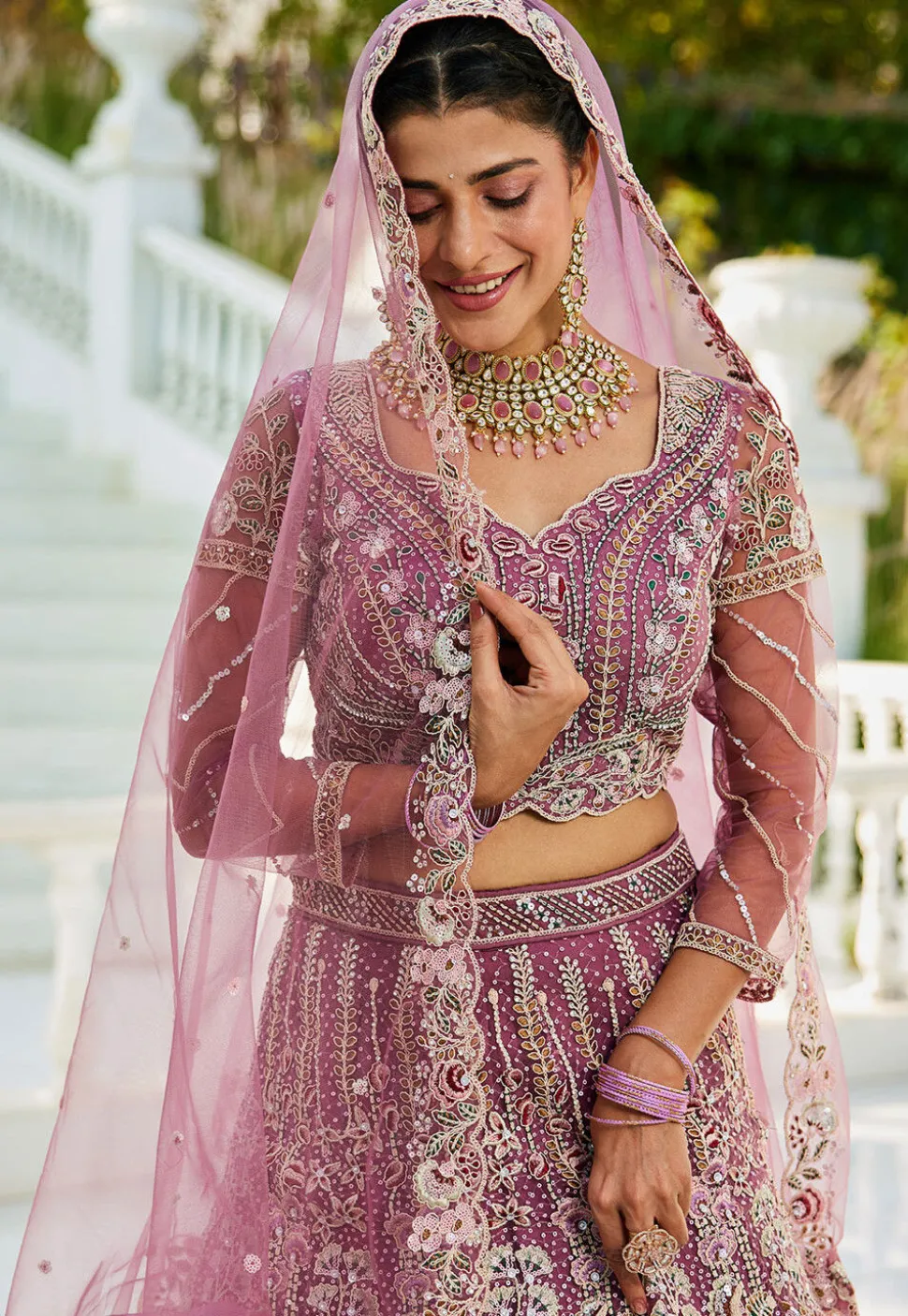 Embroidered Net Lehenga in Purple