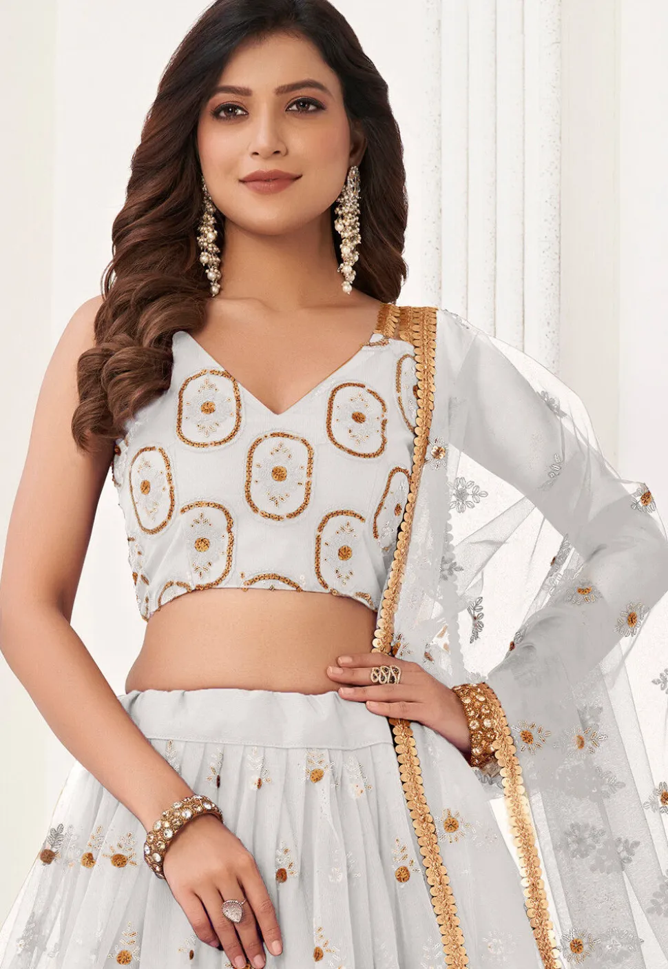 Embroidered Net Lehenga in Off White