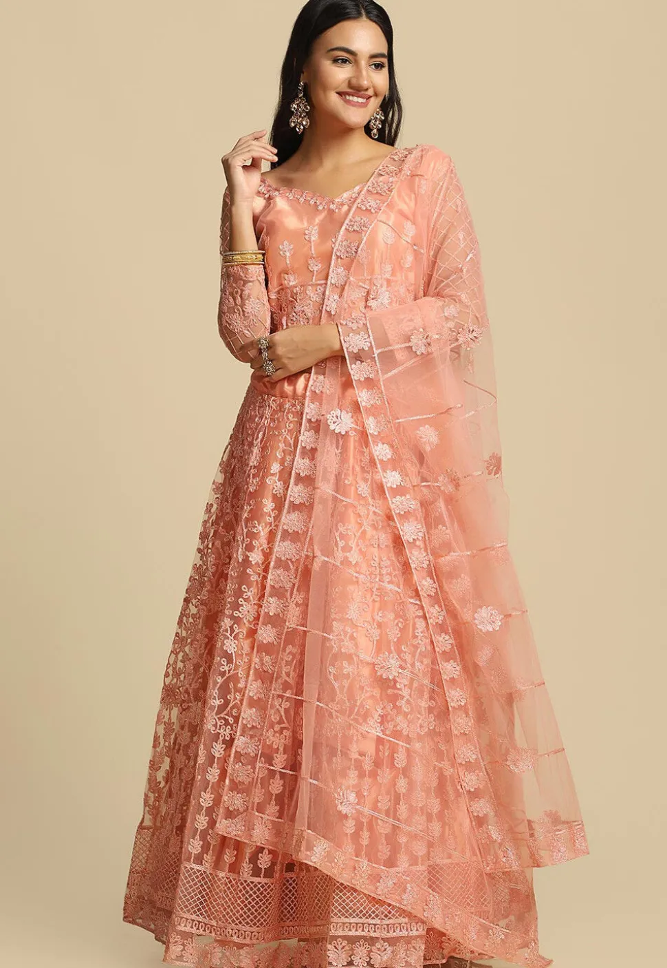 Embroidered Net Lehenga in Peach