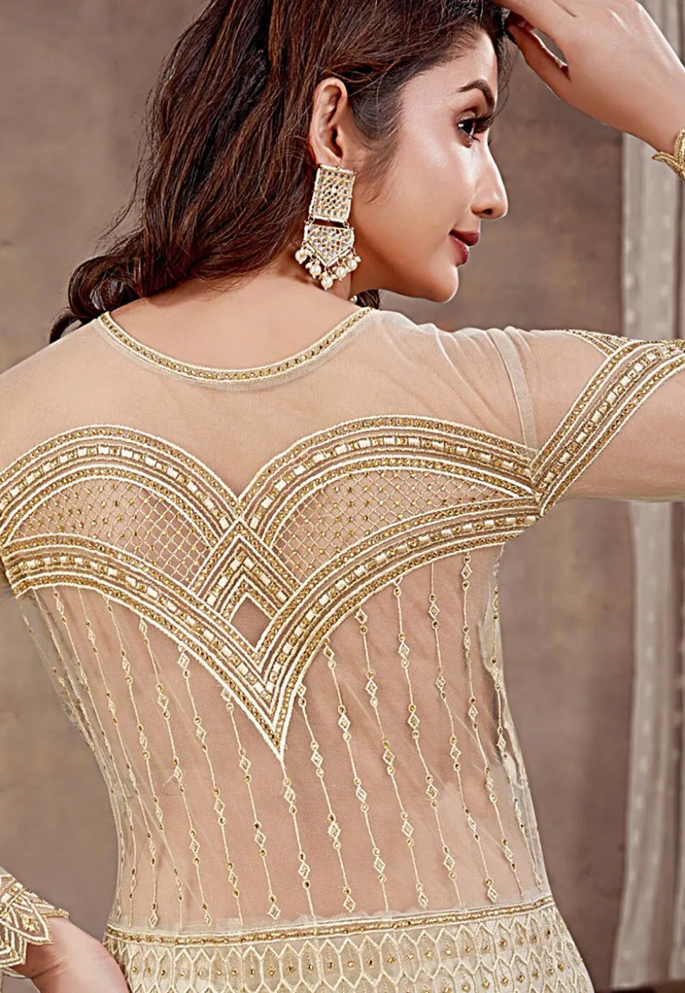 Embroidered Net Lehenga in Cream