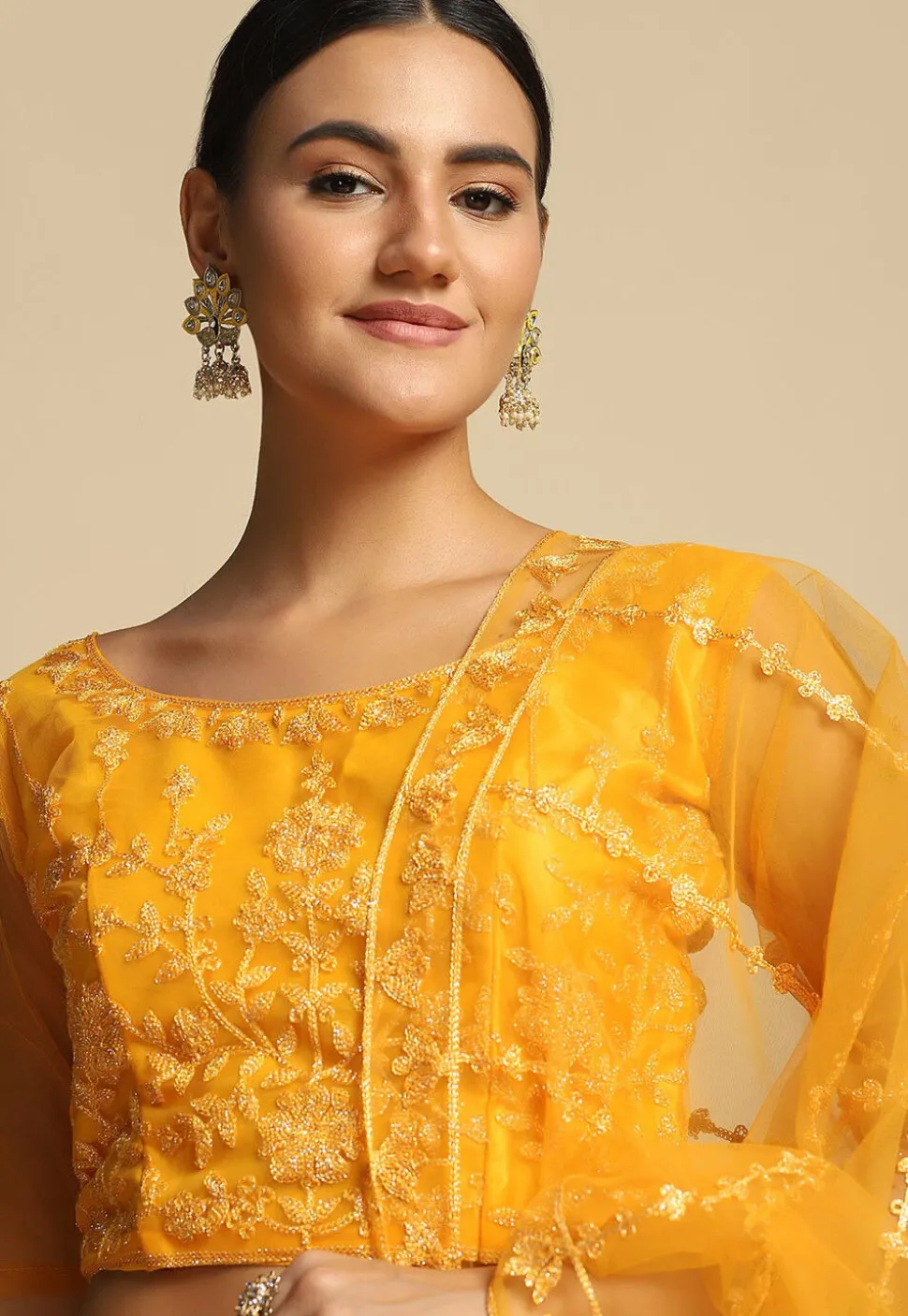 Embroidered Net Lehenga in Yellow