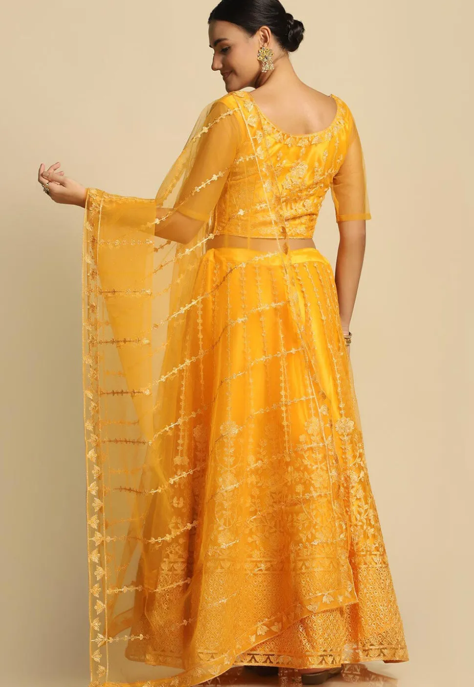 Embroidered Net Lehenga in Yellow