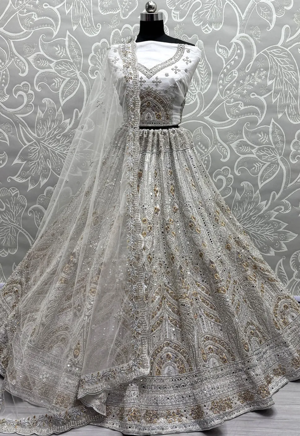 Embroidered Net Lehenga in Off White