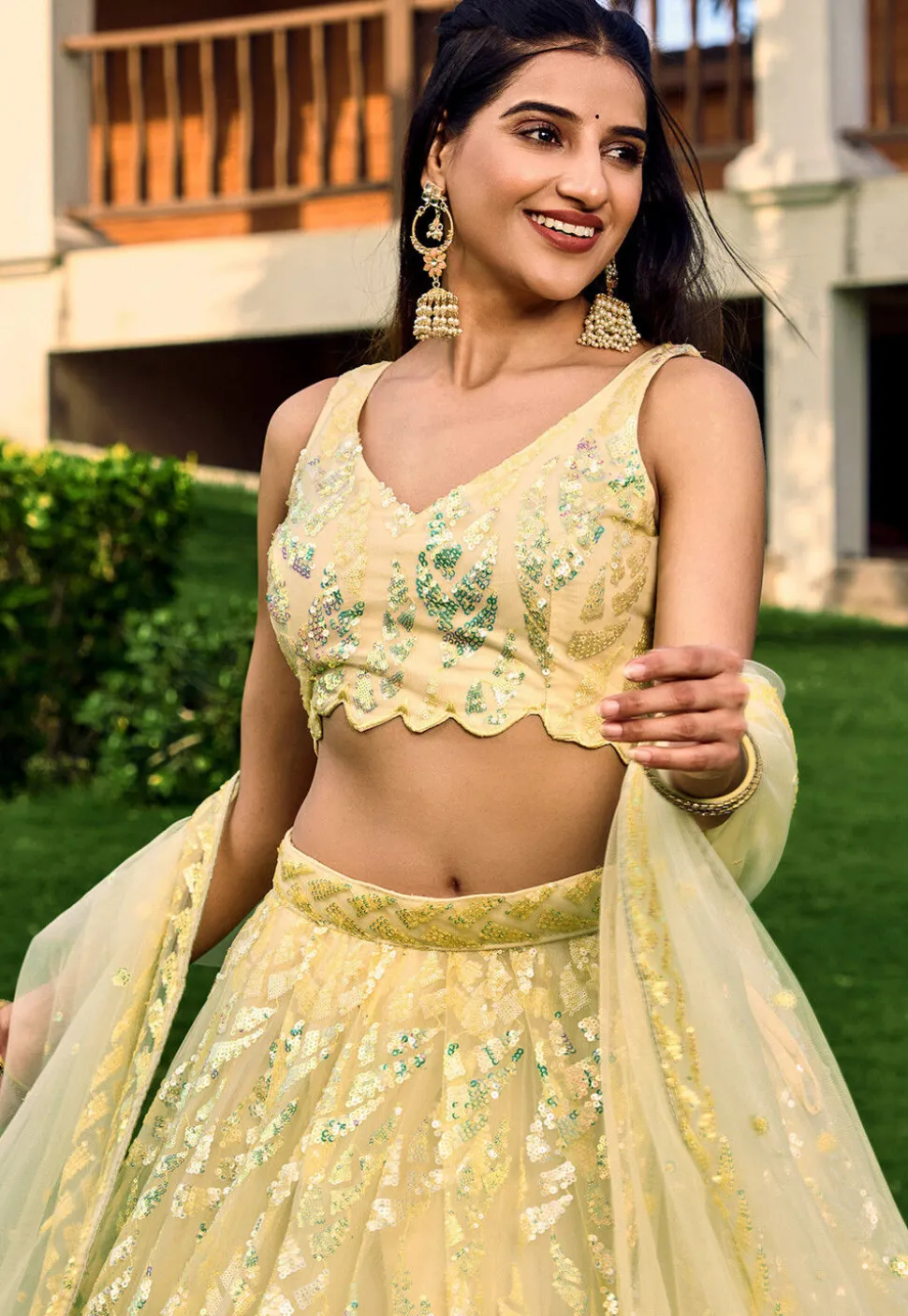 Embroidered Net Lehenga in Yellow