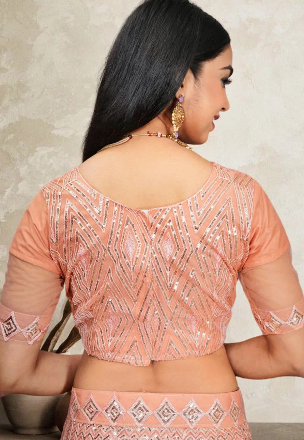 Embroidered Net Lehenga in Peach