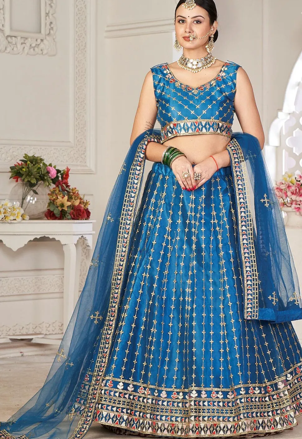 Embroidered Net Lehenga in Teal Blue