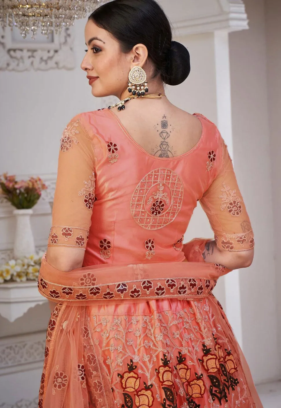 Embroidered Net Lehenga in Peach