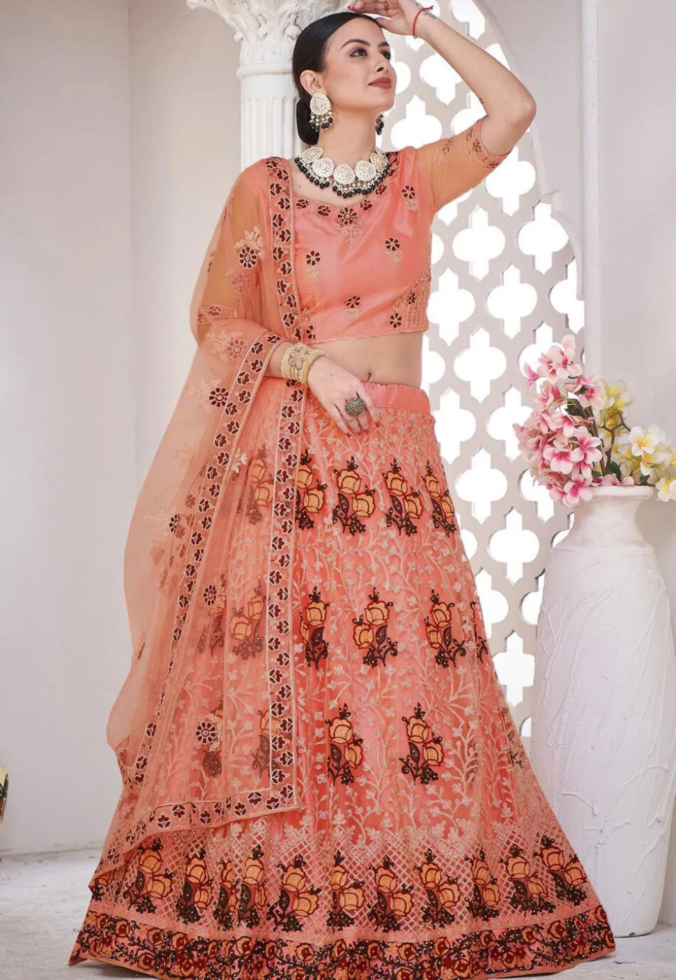 Embroidered Net Lehenga in Peach