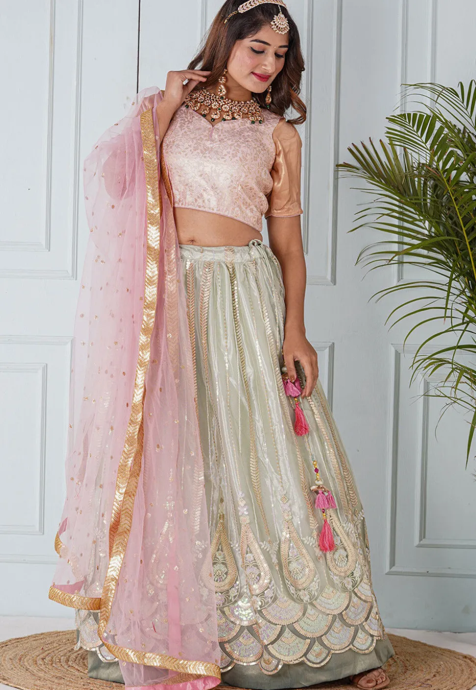 Embroidered Net Lehenga in Pastel Green
