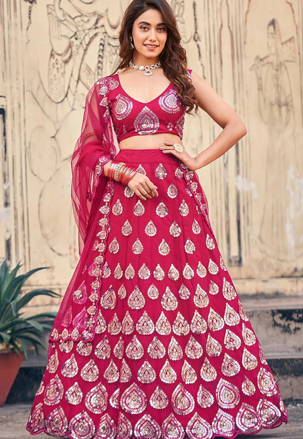 Embroidered Net Lehenga in Fuchsia