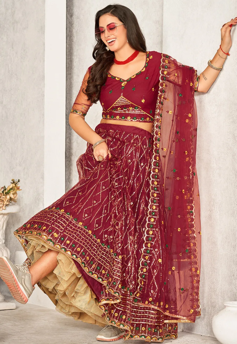 Embroidered Net Lehenga in Maroon