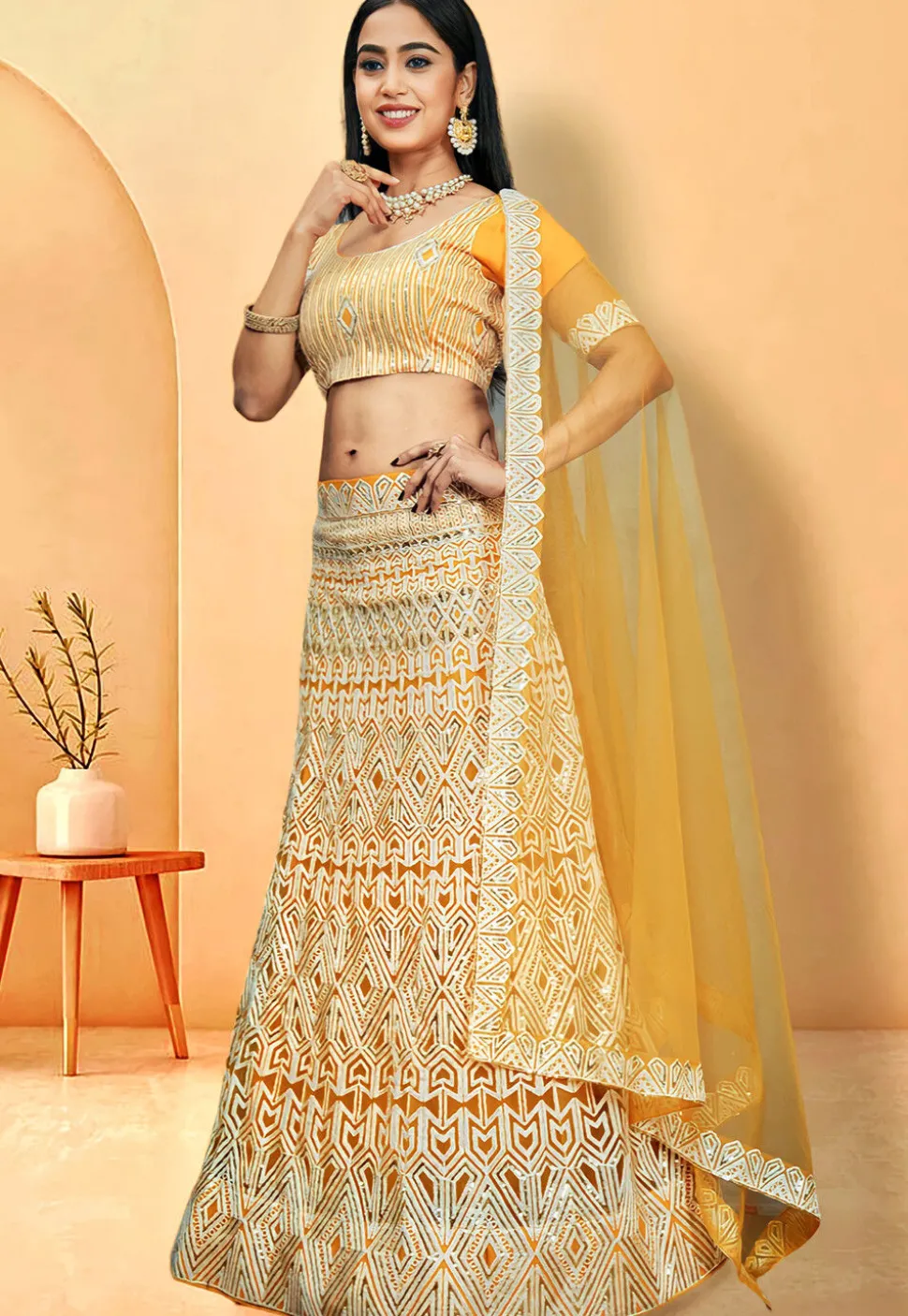 Embroidered Net Lehenga in Yellow