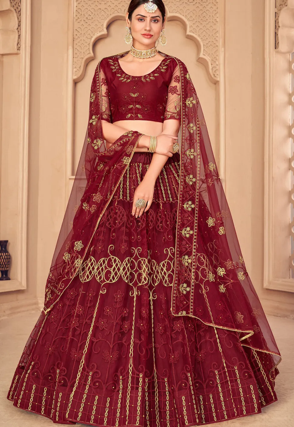 Embroidered Net Lehenga in Maroon