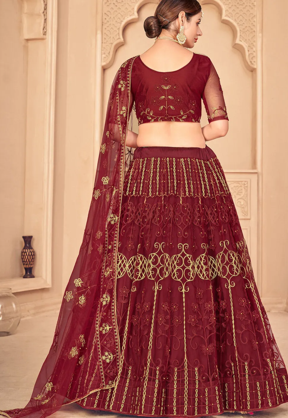 Embroidered Net Lehenga in Maroon