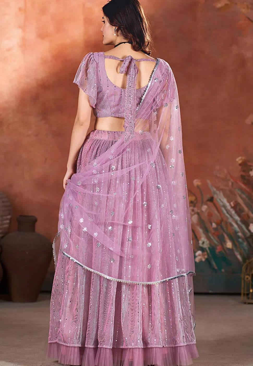 Embroidered Net Lehenga in Purple