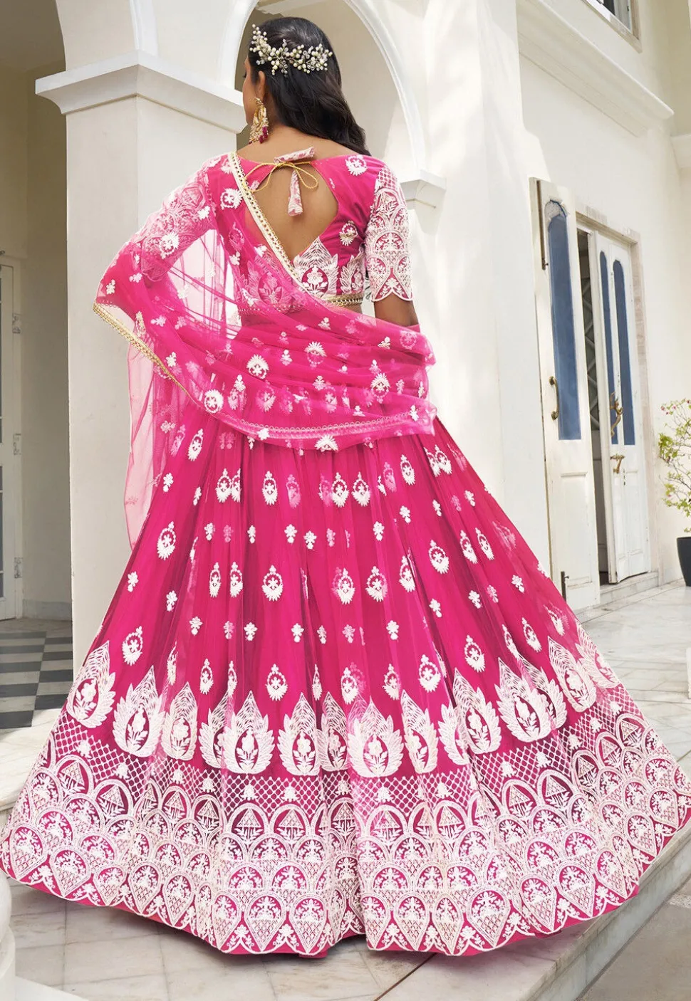 Embroidered Net Lehenga in Magenta
