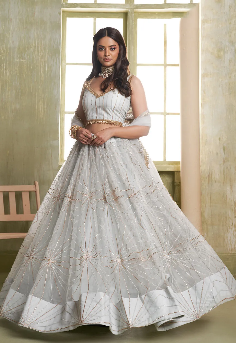 Embroidered Net Lehenga in Off White