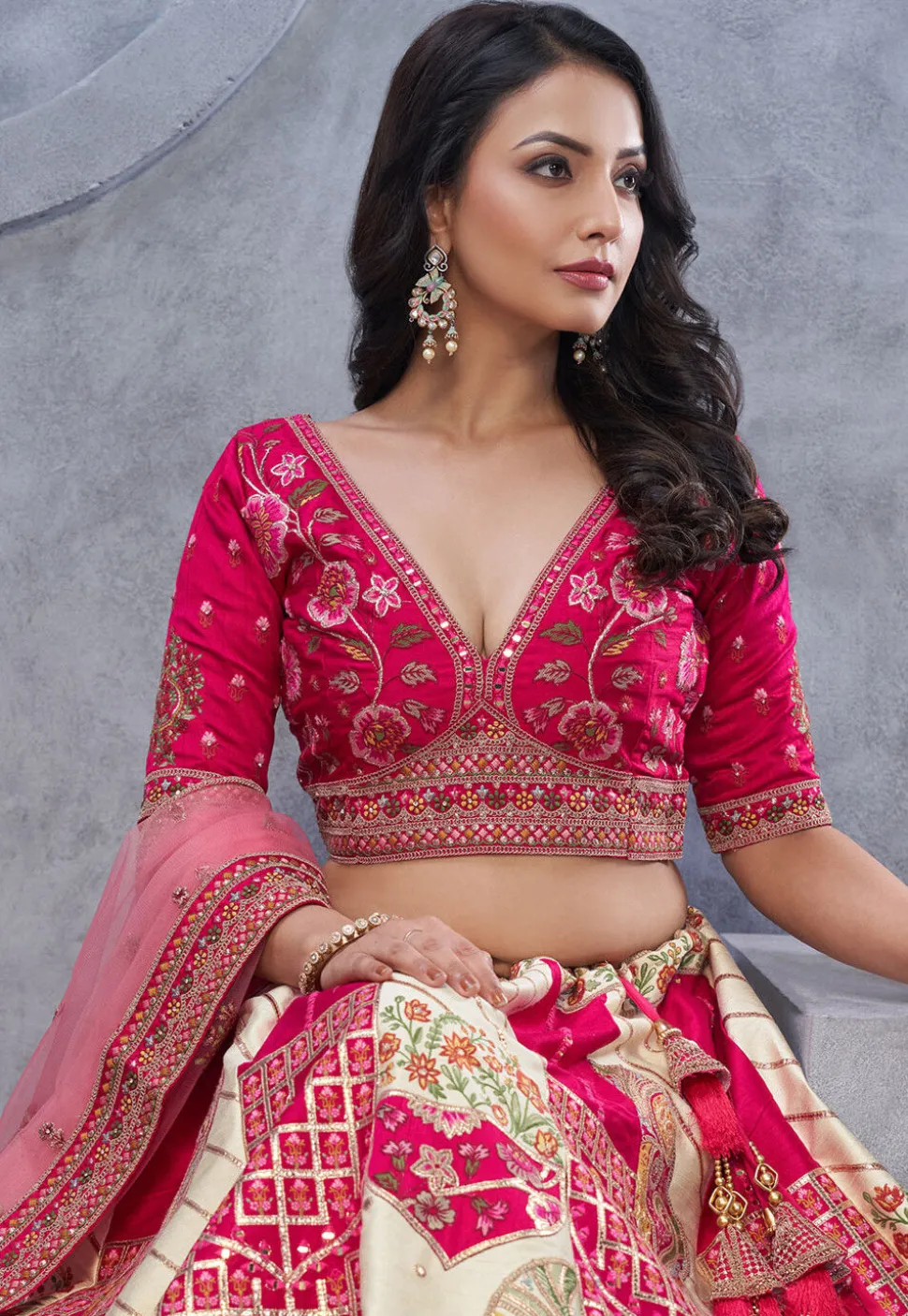 Embroidered Organza Lehenga in Cream and Fuchsia