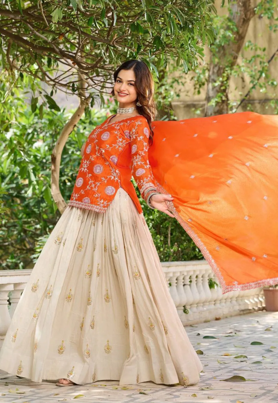 Embroidered Tissue Silk Lehenga in Cream