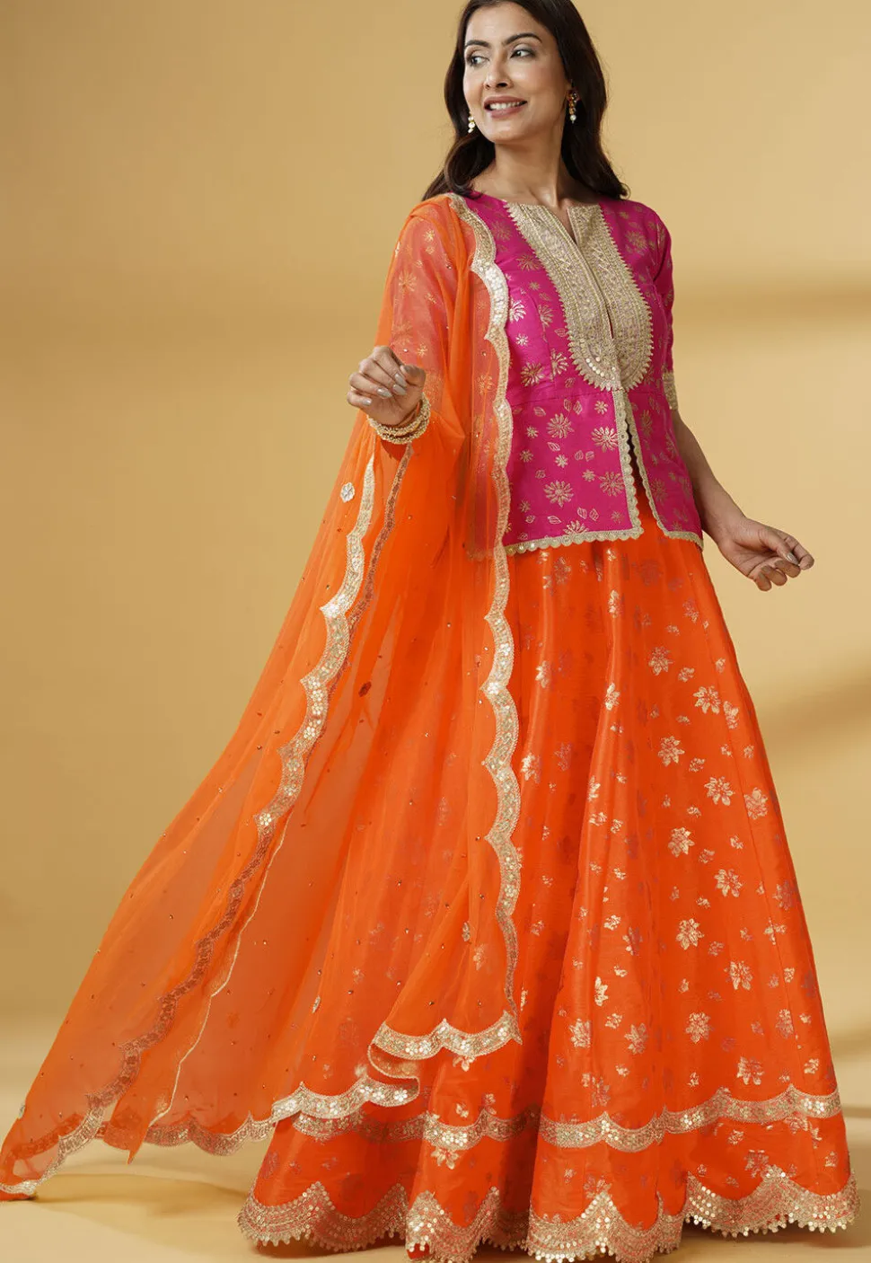 Foil Printed Dupion Silk Lehenga in Orange