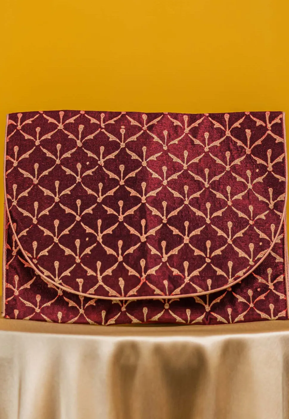 Golden Printed Art Silk Clutch Bag in Maroon