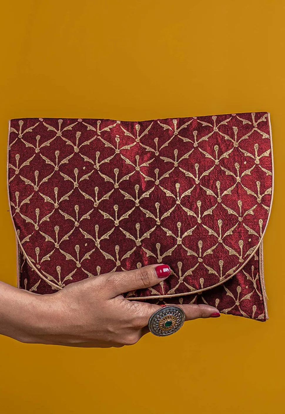 Golden Printed Art Silk Clutch Bag in Maroon
