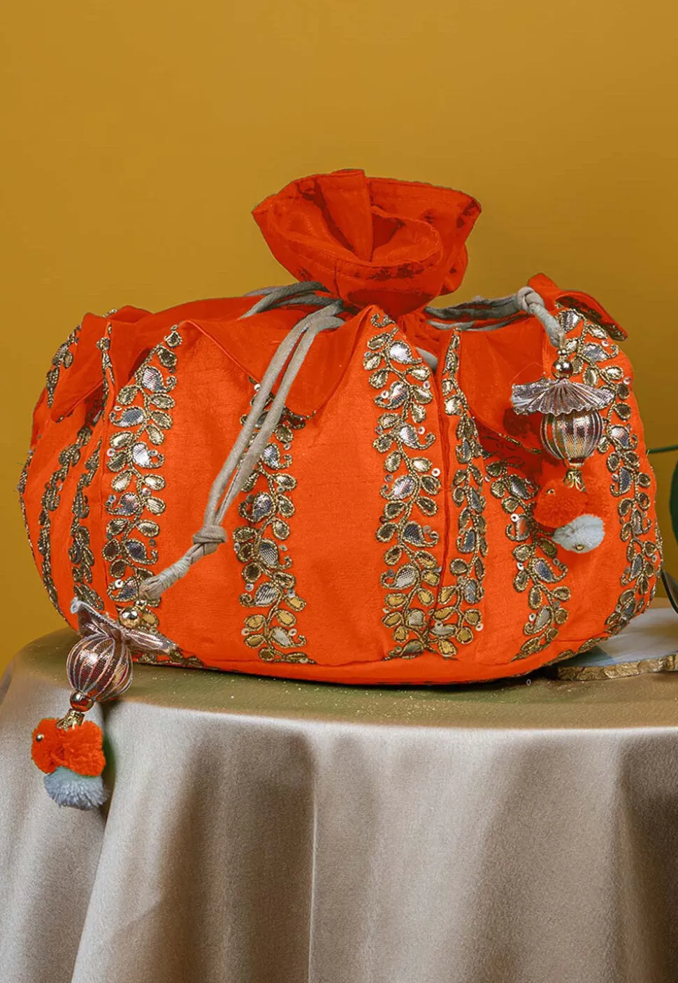 Gota Patti Art Silk Potli Bag in Orange