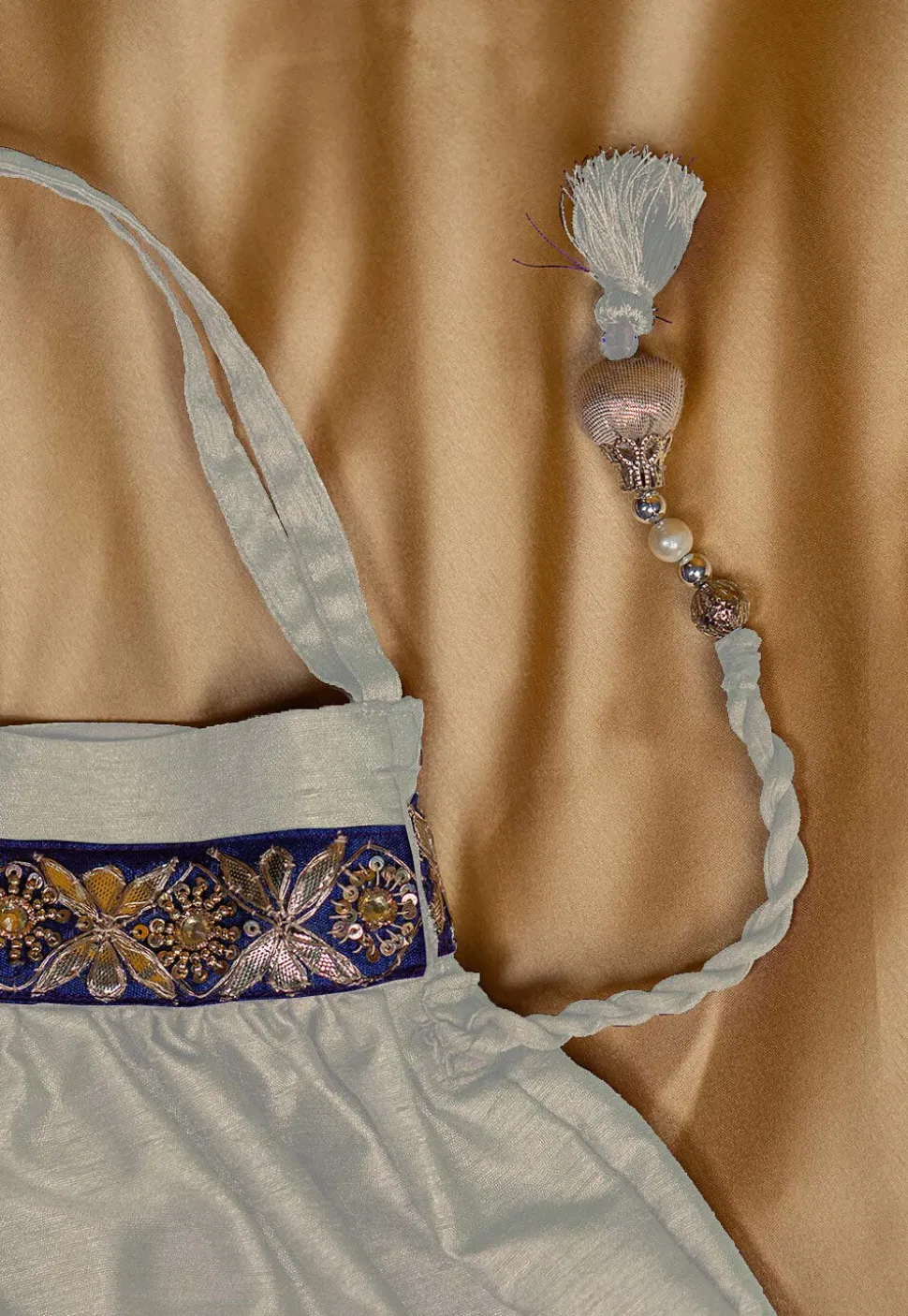 Gota Patti Art Silk Potli Bag in Off White