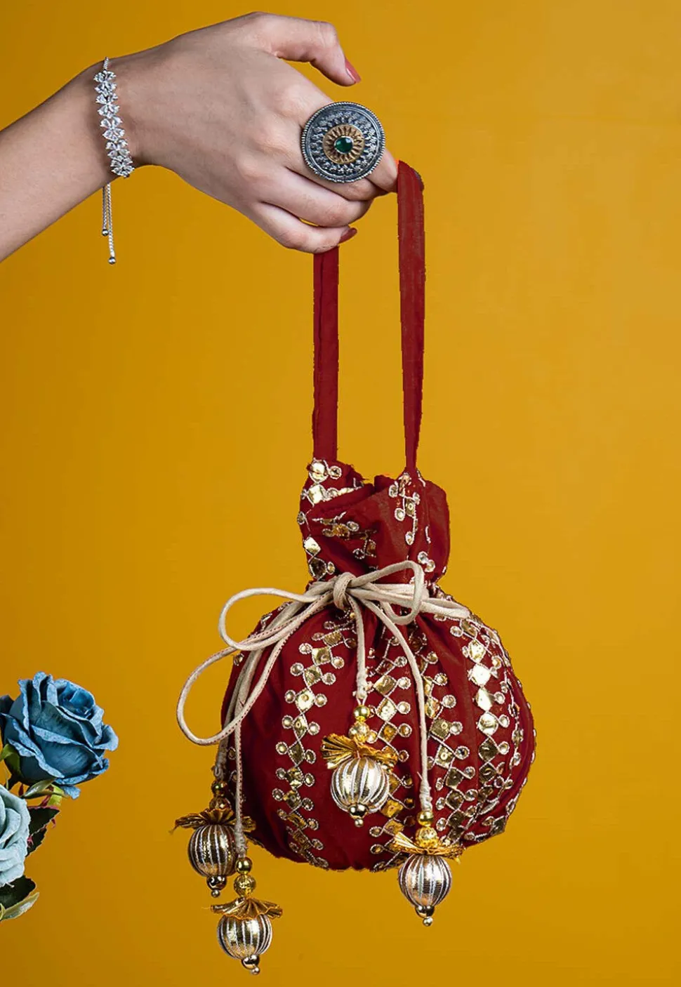 Gota Patti Art Silk Potli Bag in Maroon