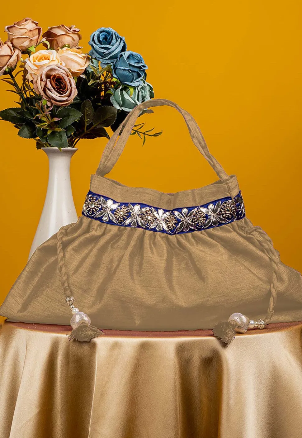 Gota Patti Art Silk Potli Bag in Beige