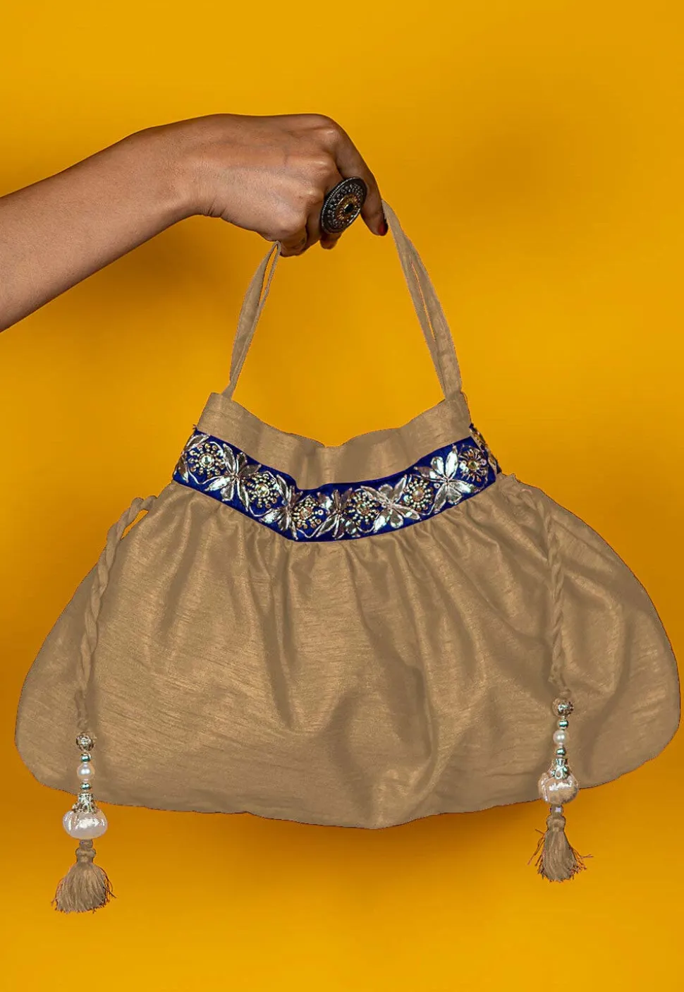Gota Patti Art Silk Potli Bag in Beige